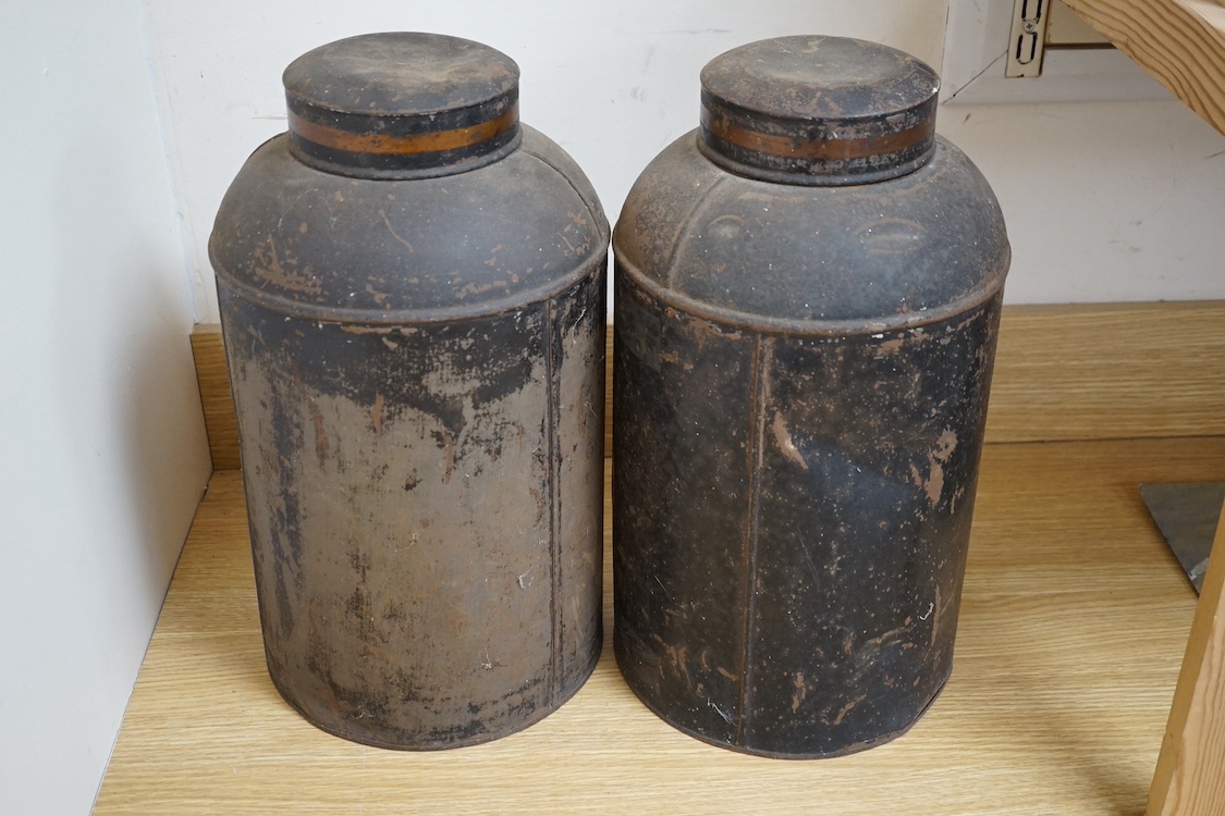 Two painted tin tea caddies, 43cm high. Condition - poor